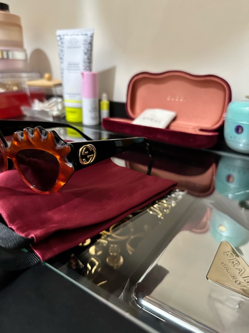 Authentic Gucci Women’s orange Frame Sunglasses with Black Arms and Gold Logo